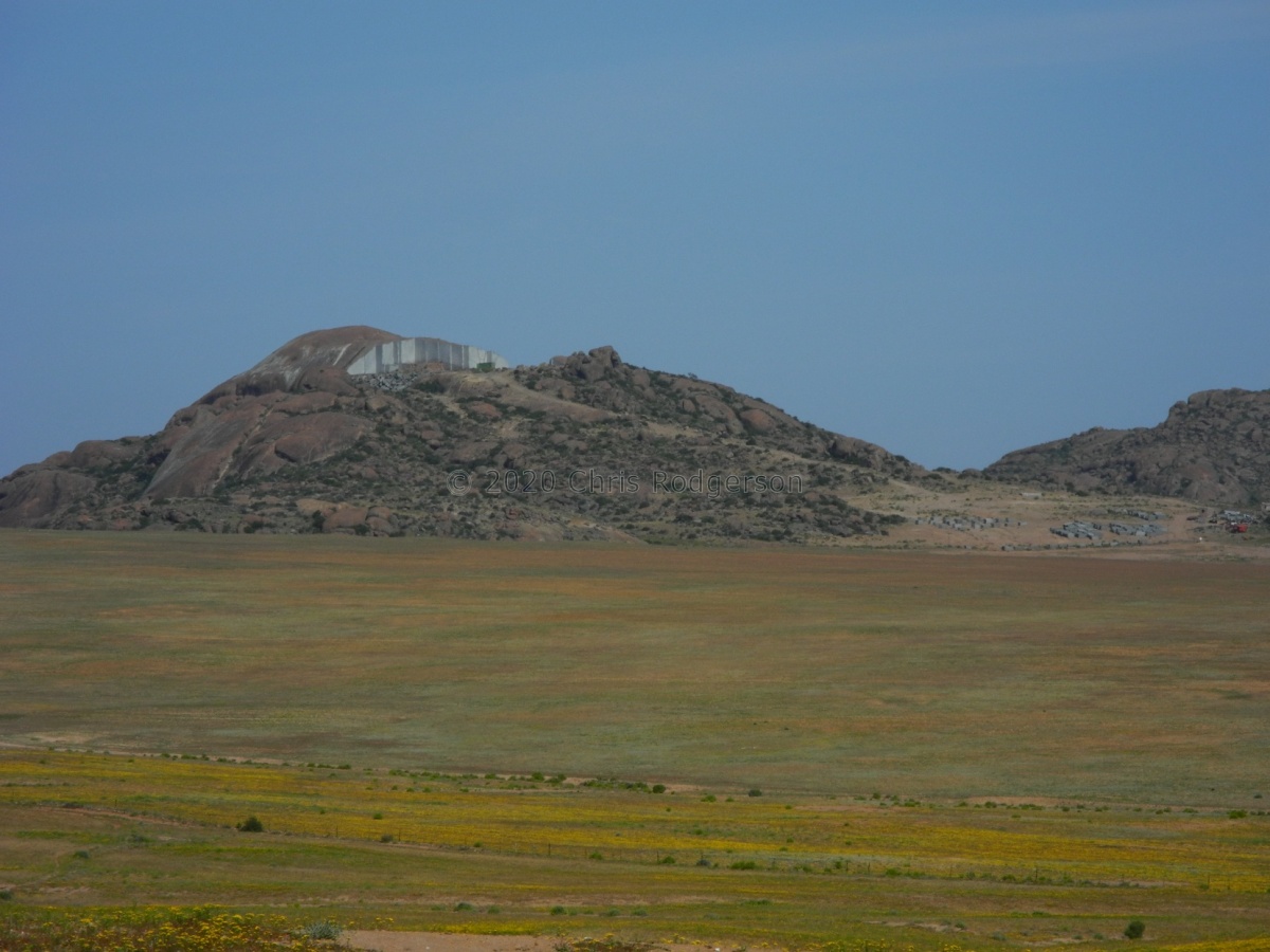 granite dome being cut away for kitchen and gravestones, etc..JPG